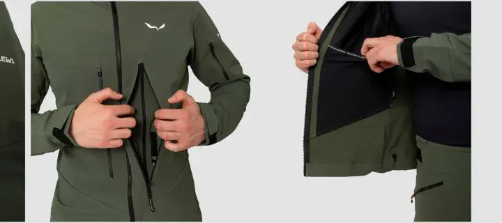 Zielona kurtka softshell bez membrany, z zamkami i logo Salewa. Idealna na wędrówki.